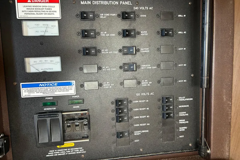  Yacht Photos Pics Main distribution panel of 2016 Sea Ray 400 Sundancer boat, showing switches and meters.