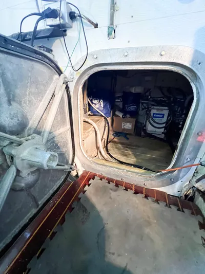 Lb. Cake Yacht Photos Pics Engine room access hatch on a 1987 Buddy Davis 61 Convertible boat.