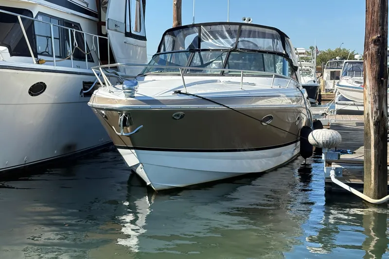 Cool Change Yacht Photos Pics 2008 Formula 350 Sun Sport boat docked at marina, surrounded by other vessels.