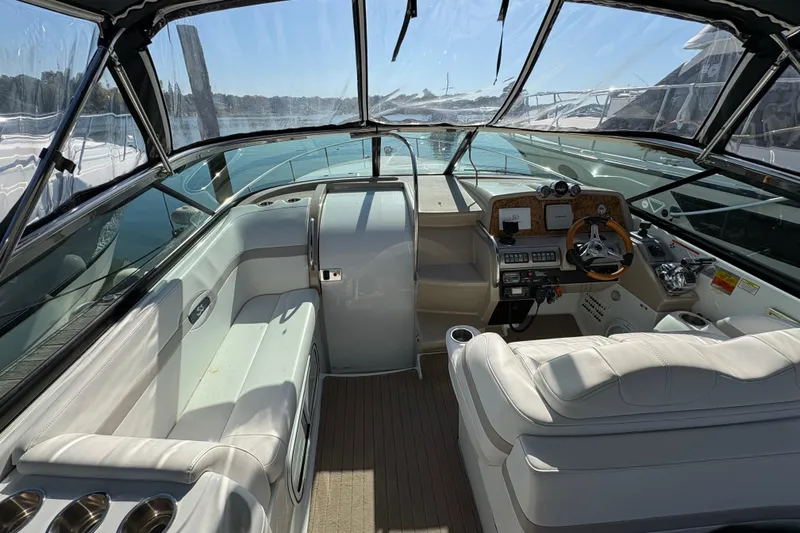 Cool Change Yacht Photos Pics 2008 Formula 350 Sun Sport boat interior with helm, seating, and dashboard controls.