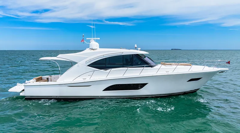 Boa Vida Yacht Photos Pics 2017 Riviera 575 SUV luxury yacht cruising on open water.