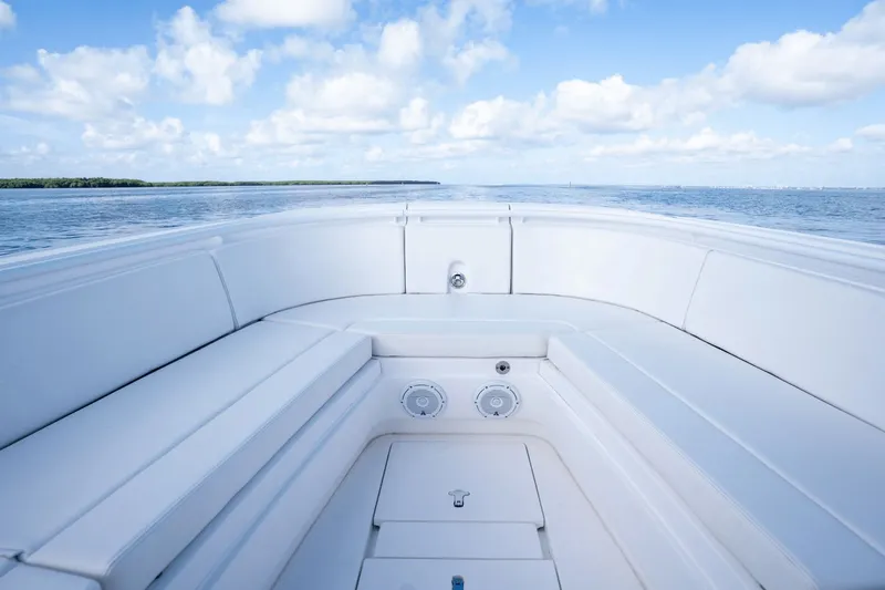  Yacht Photos Pics 2015 Intrepid 327 CC INFUSED boat interior with ocean view and blue sky.