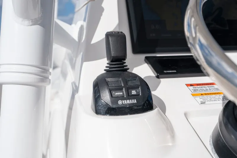  Yacht Photos Pics Close-up of Yamaha joystick control on 2015 Intrepid 327 CC INFUSED boat.