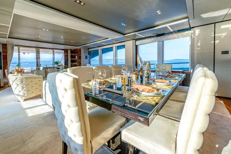 Riviera Living Yacht Photos Pics Luxurious dining area on a 2017 Princess 35M yacht with ocean views.