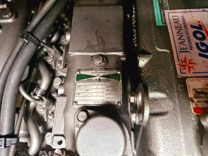  Yacht Photos Pics Engine components of a 2006 Jeanneau Sun Odyssey 49 sailboat, featuring detailed labels and parts.