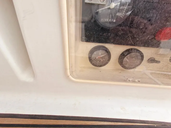  Yacht Photos Pics Control panel of 2006 Jeanneau Sun Odyssey 49 sailboat, featuring gauges and dials.