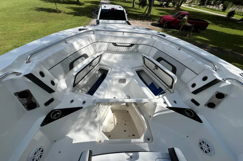  Yacht Photos Pics 2023 Blackfin 272 boat interior with open storage compartments, sleek design, and modern features.