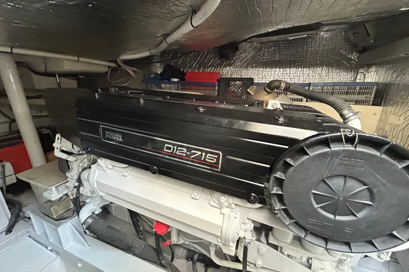  Yacht Photos Pics Engine room of 2003 Cruisers Yachts 540 Express with Volvo Penta D12-715 engine.