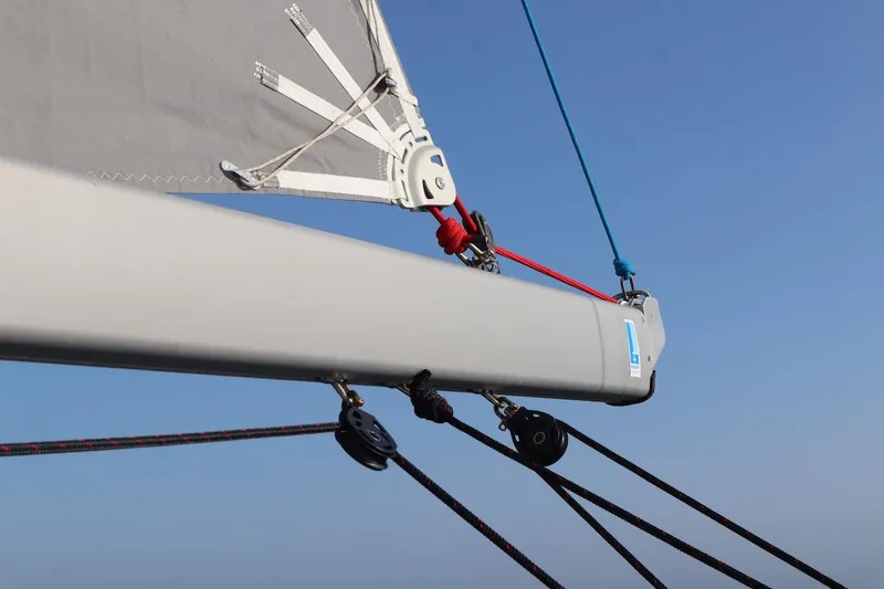Margaret Yacht Photos Pics Close-up of Beneteau Oceanis 48 sailboat rigging against clear blue sky.