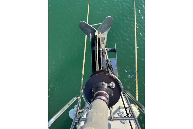 Margaret Yacht Photos Pics Bow view of 2014 Beneteau Oceanis 48 sailboat with anchor and ropes.