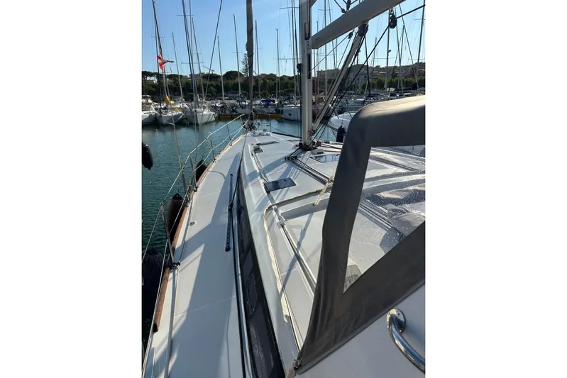 Margaret Yacht Photos Pics 2014 Beneteau Oceanis 48 sailboat deck view in marina.
