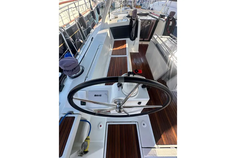 Margaret Yacht Photos Pics 2014 Beneteau Oceanis 48 yacht cockpit with dual steering wheels and teak flooring.