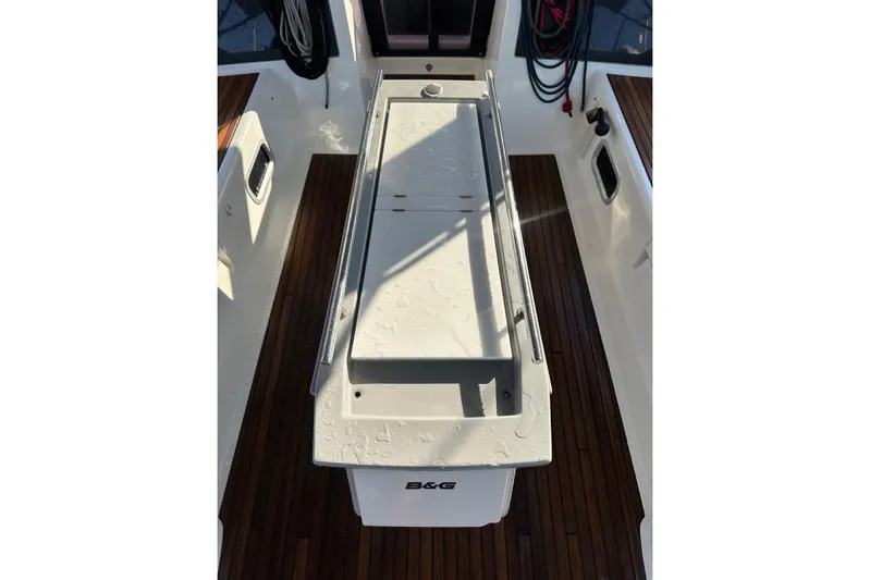 Margaret Yacht Photos Pics Cockpit of 2014 Beneteau Oceanis 48 with teak flooring and central console.