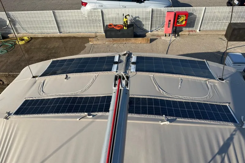 Margaret Yacht Photos Pics Solar panels on 2014 Beneteau Oceanis 48 yacht deck, docked in marina.