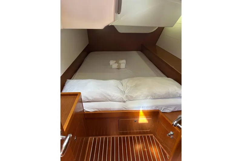 Margaret Yacht Photos Pics Cozy cabin interior of 2014 Beneteau Oceanis 48 yacht with wooden finish.