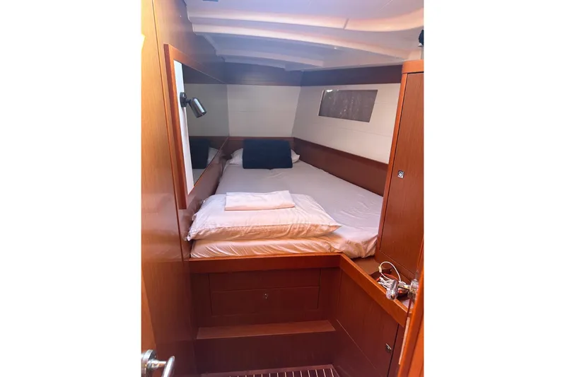 Margaret Yacht Photos Pics Cozy cabin interior of 2014 Beneteau Oceanis 48 yacht with wooden finish.