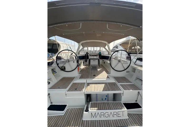 Margaret Yacht Photos Pics 2014 Beneteau Oceanis 48 sailboat cockpit with dual steering wheels and teak decking.