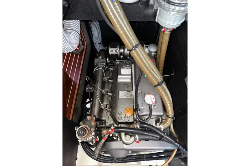 Margaret Yacht Photos Pics Engine compartment of a 2014 Beneteau Oceanis 48 sailboat, showcasing detailed components.
