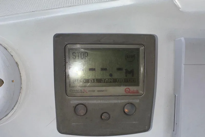 Margaret Yacht Photos Pics Control panel on a 2014 Beneteau Oceanis 48 sailboat displaying "STOP" message.