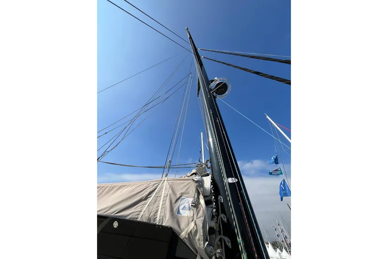 Dimemar Yacht Photos Pics Sailboat mast of 2021 Privilege 580 SIGNATURE against clear blue sky.