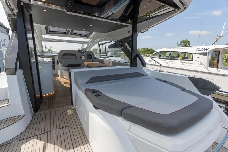  Yacht Photos Pics 2025 Beneteau Gran Turismo 45 yacht interior with spacious seating and modern design.