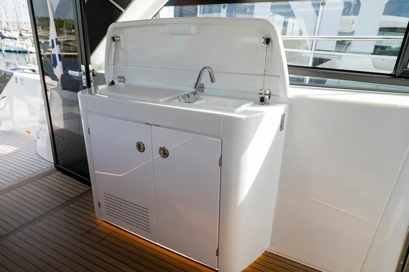  Yacht Photos Pics 2025 Beneteau Gran Turismo 45 yacht sink area with sleek design and modern fixtures.