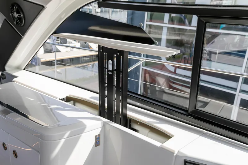  Yacht Photos Pics 2025 Beneteau Gran Turismo 45 yacht interior with retractable TV lift system.