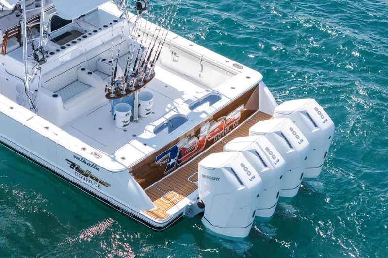 Galati Yacht Sales Trade Yacht Photos Pics 2024 Valhalla V-55 boat with five Mercury engines on blue ocean water.