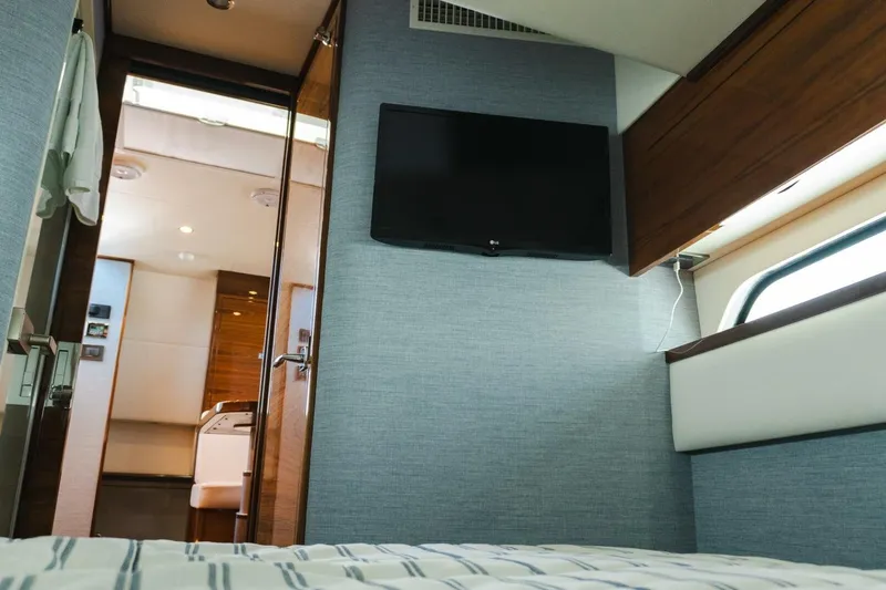 Galati Yacht Sales Trade Yacht Photos Pics 2024 Valhalla Boatworks V-55 cabin interior with TV and modern design.