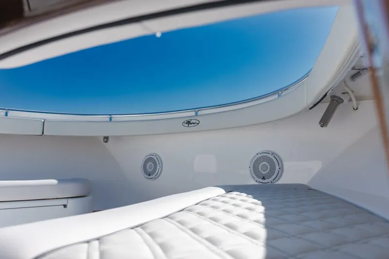 Galati Yacht Sales Trade Yacht Photos Pics 2024 Valhalla Boatworks V-55 interior with quilted seating and speakers.