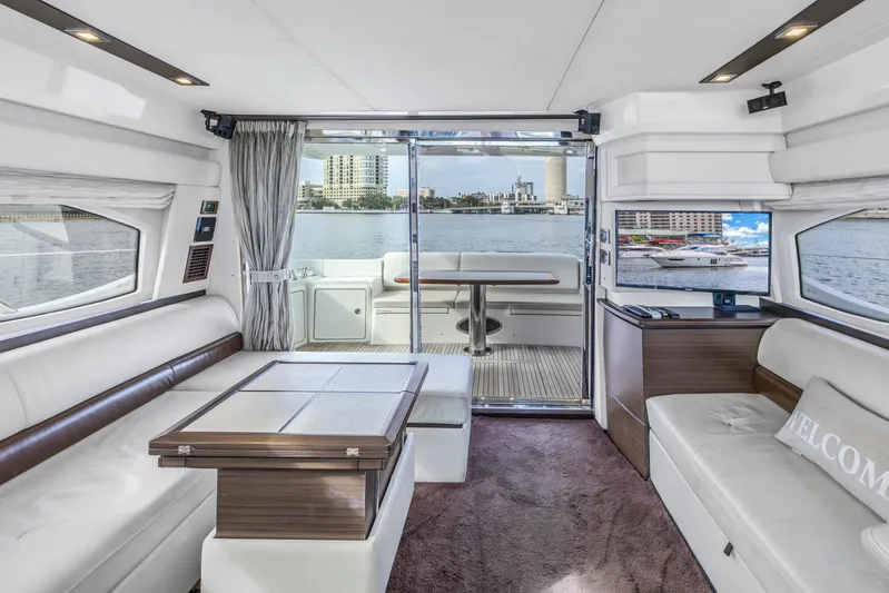 Liquidity Yacht Photos Pics Interior of 2012 Azimut 48 Flybridge yacht with waterfront view.