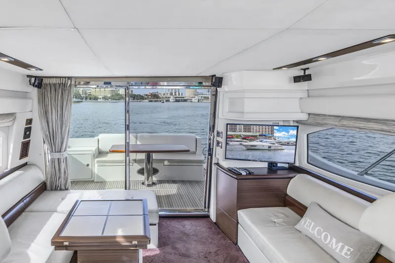 Liquidity Yacht Photos Pics Interior of 2012 Azimut 48 Flybridge yacht with waterfront view.