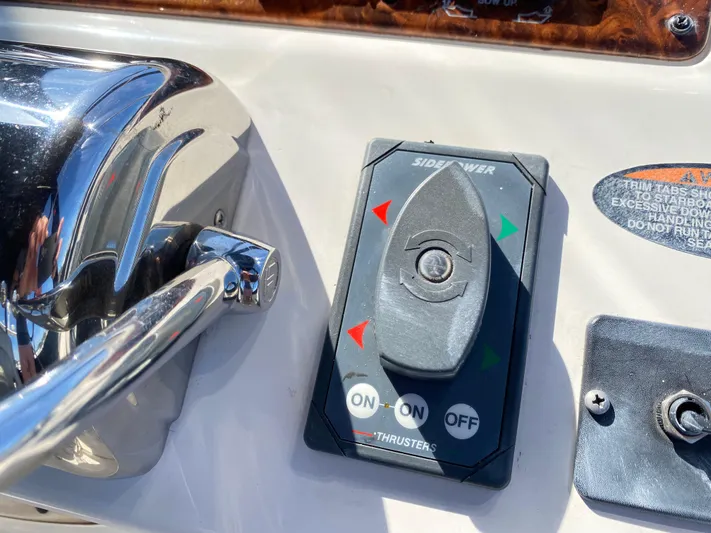  Yacht Photos Pics Close-up of 2004 Meridian 381 Sedan boat control panel with side thruster switch.