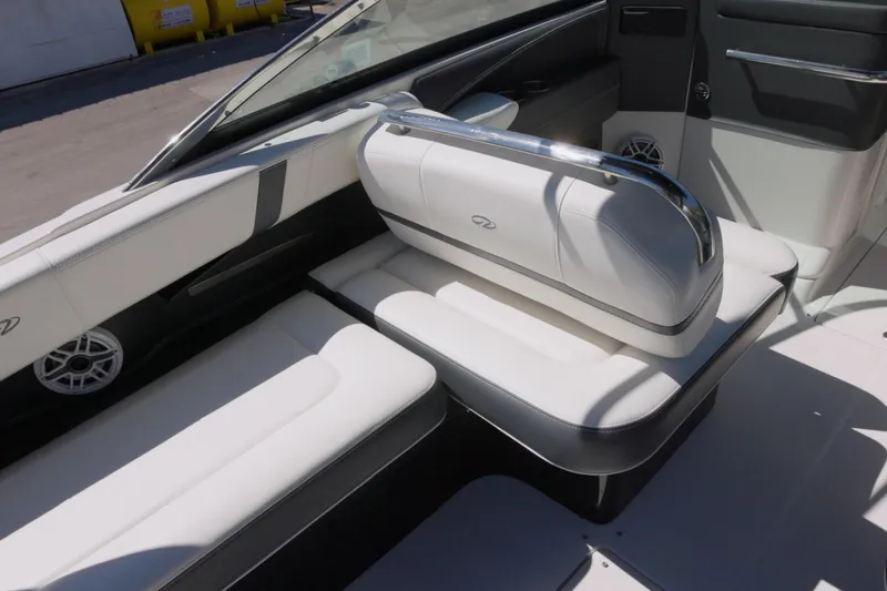  Yacht Photos Pics 2017 Regal 29 OBX boat interior with white leather seating and chrome accents.