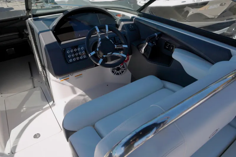  Yacht Photos Pics 2017 Regal 29 OBX boat cockpit with modern steering and controls.