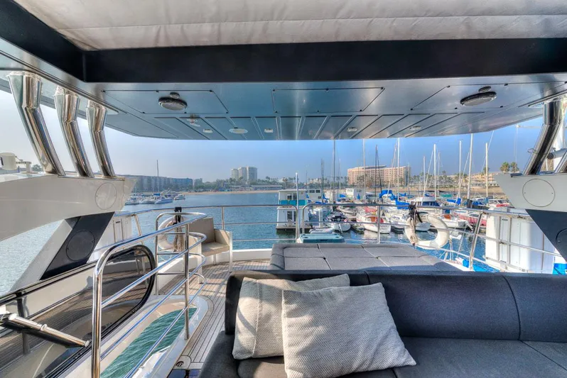 Mojo Risin' Yacht Photos Pics Luxurious 2017 Sunseeker 75 Yacht interior with marina view.