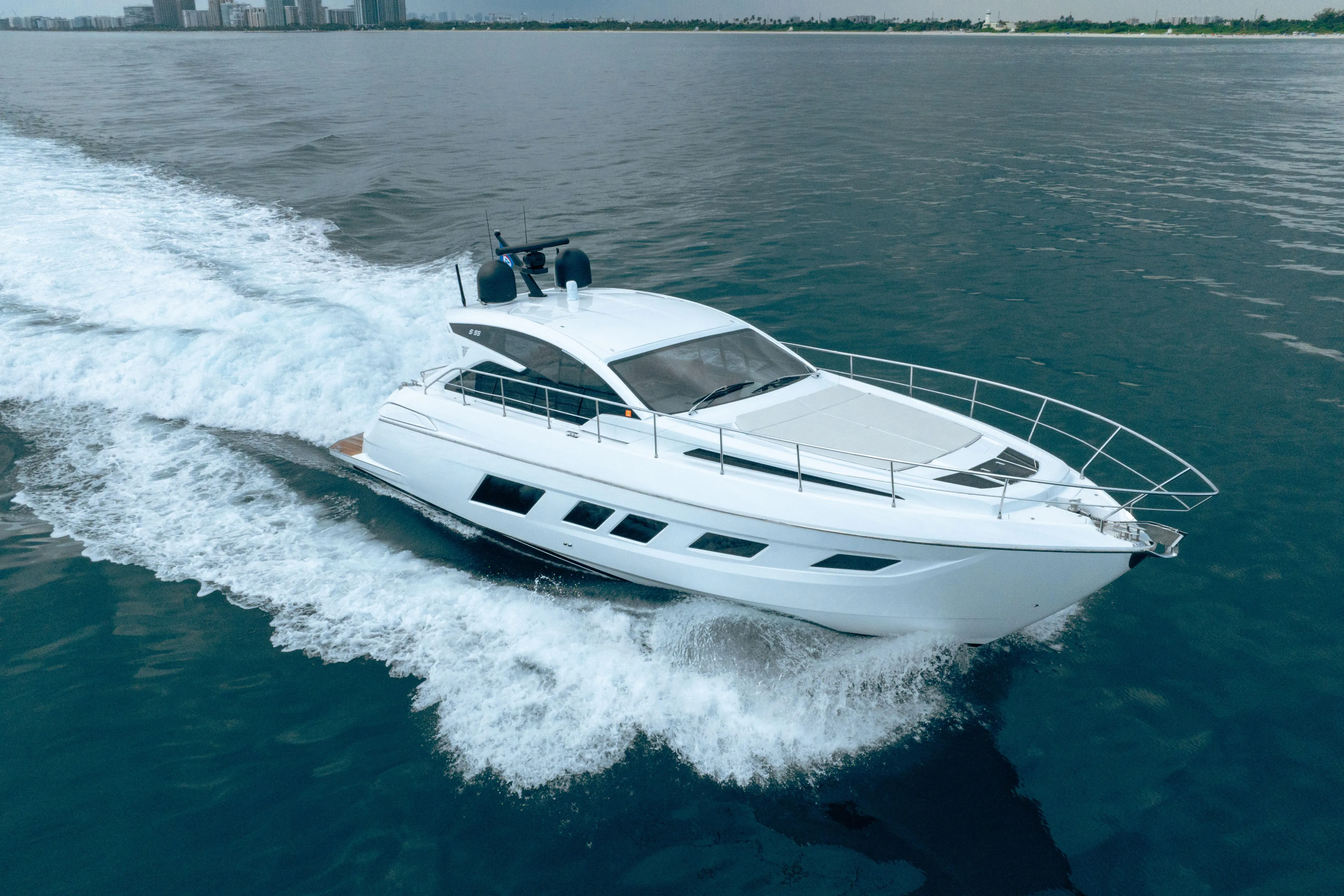 Juice Yacht Photos Pics 2019 Filippetti S55 yacht cruising on open water, showcasing sleek design and performance.