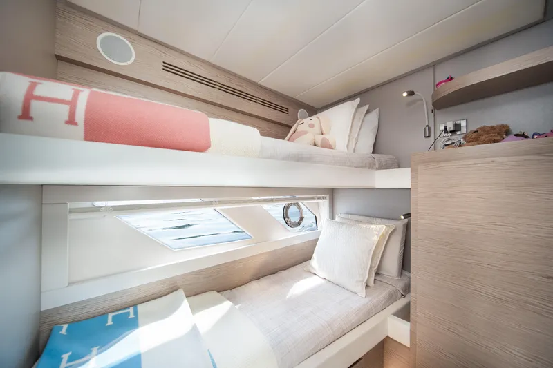 Juice Yacht Photos Pics Luxurious 2019 Filippetti S55 yacht cabin with cozy bunk beds and modern decor.
