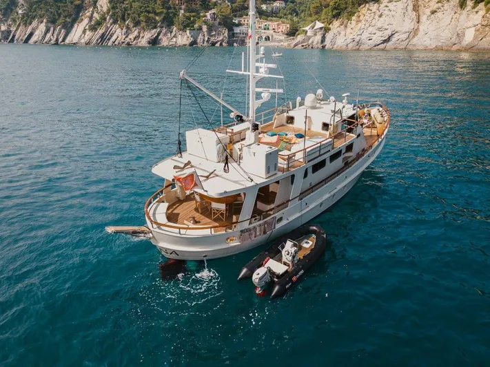 Yona Yacht Photos Pics 1981 Vripack Doggersbank 20 yacht anchored in scenic coastal waters.