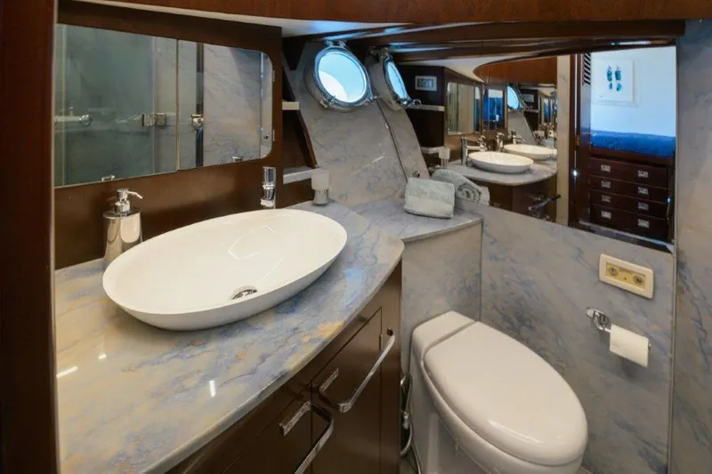 Yona Yacht Photos Pics Luxurious bathroom in 1981 Vripack Doggersbank 20 yacht with modern fixtures and elegant design.