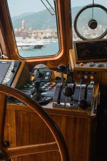 Yona Yacht Photos Pics Cockpit of 1981 Vripack Doggersbank 20 yacht with navigation controls and scenic view.
