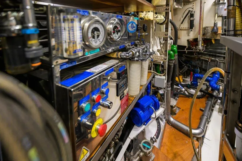 Yona Yacht Photos Pics Engine room of 1981 Vripack Doggersbank 20 yacht, featuring control panels and machinery.