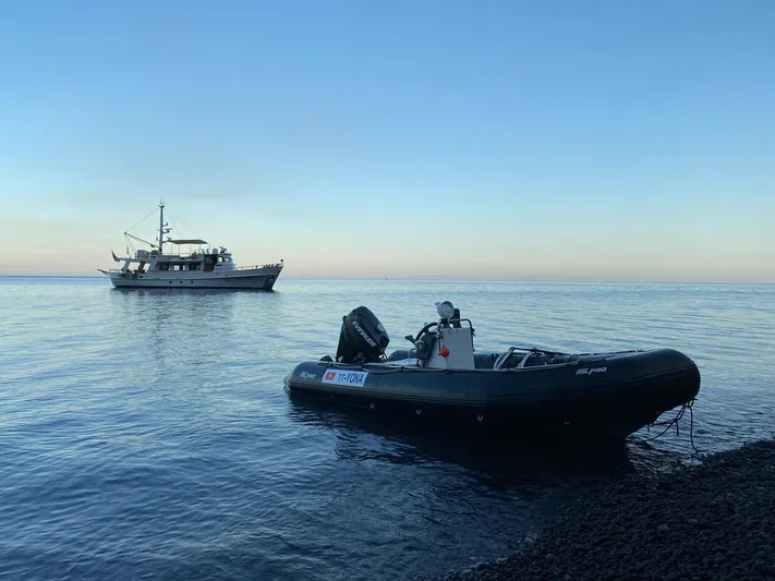 Yona Yacht Photos Pics 1981 Vripack Doggersbank 20 yacht on calm sea with inflatable boat nearby.