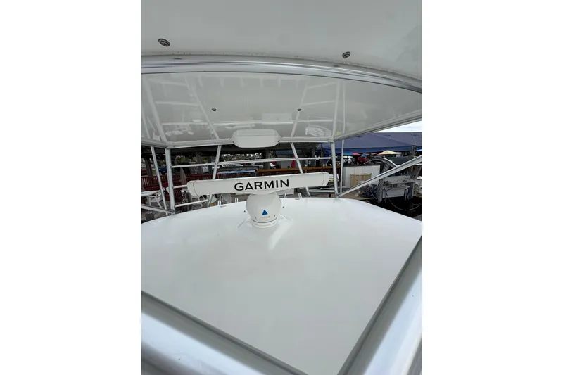 Reelity Check Yacht Photos Pics 2004 Cabo 40 Hardtop Express boat with Garmin radar system on deck.