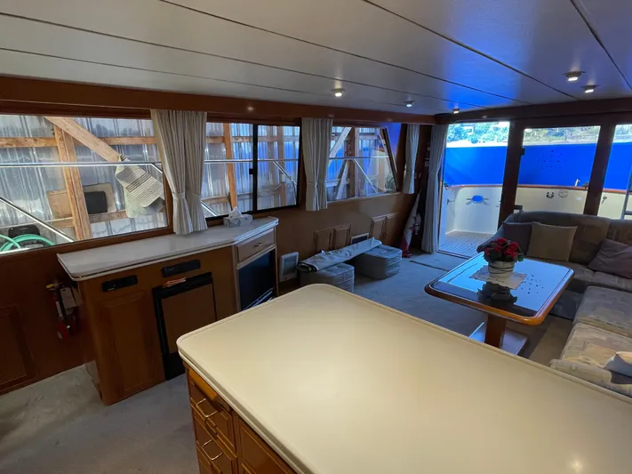 Wind Star Yacht Photos Pics Luxurious interior of 1993 Ocean Alexander 520 Pilothouse yacht with spacious seating and elegant decor.