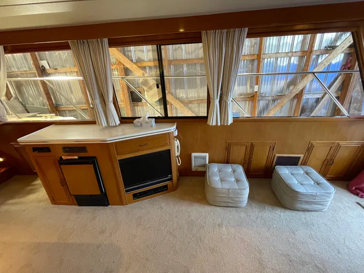 Wind Star Yacht Photos Pics Interior of 1993 Ocean Alexander 520 Pilothouse with seating and cabinetry.