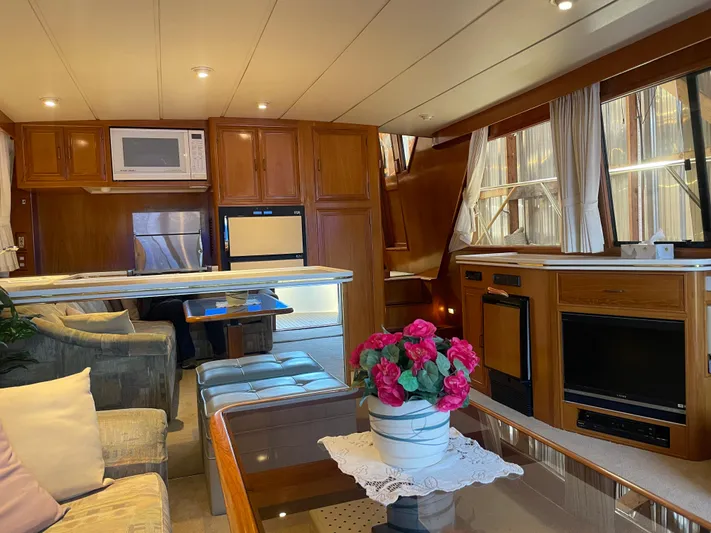Wind Star Yacht Photos Pics Luxurious interior of 1993 Ocean Alexander 520 Pilothouse yacht with modern amenities.