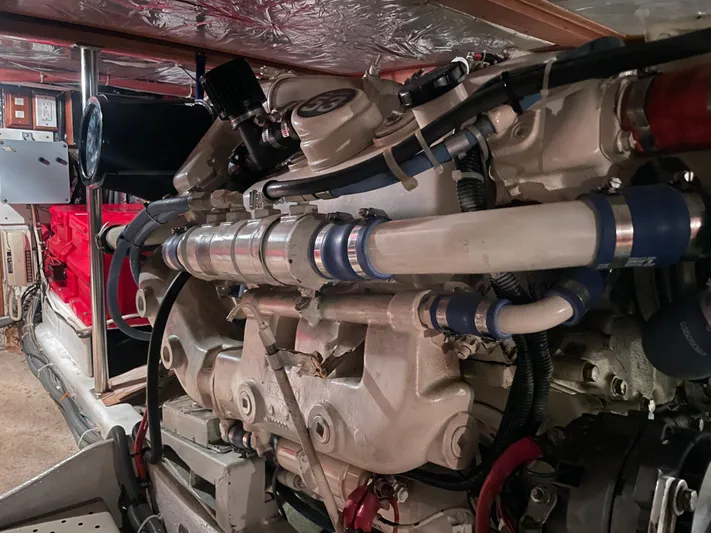 Wind Star Yacht Photos Pics Engine room of 1993 Ocean Alexander 520 Pilothouse yacht, showcasing detailed machinery and components.