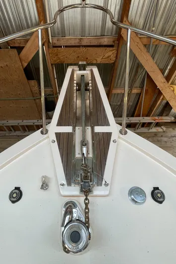 Wind Star Yacht Photos Pics 1993 Ocean Alexander 520 Pilothouse anchor system in a wooden boathouse.