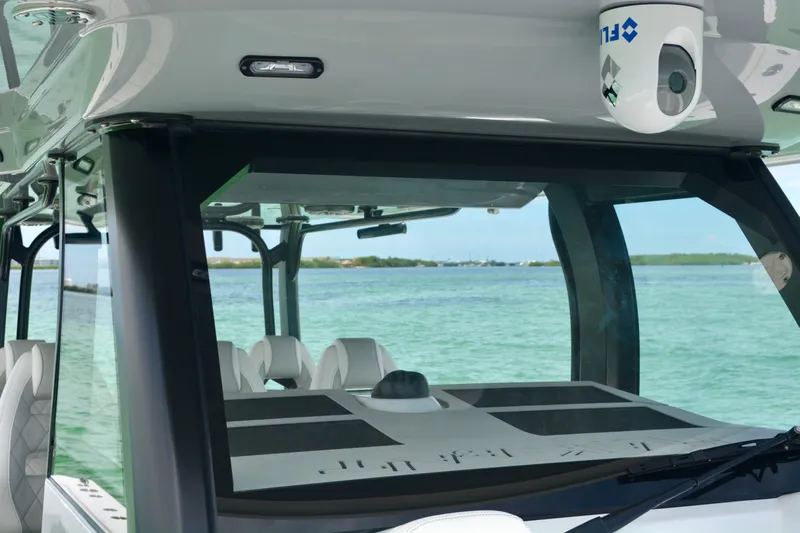  Yacht Photos Pics 2023 Freeman 43 boat interior with modern design, overlooking clear blue water.